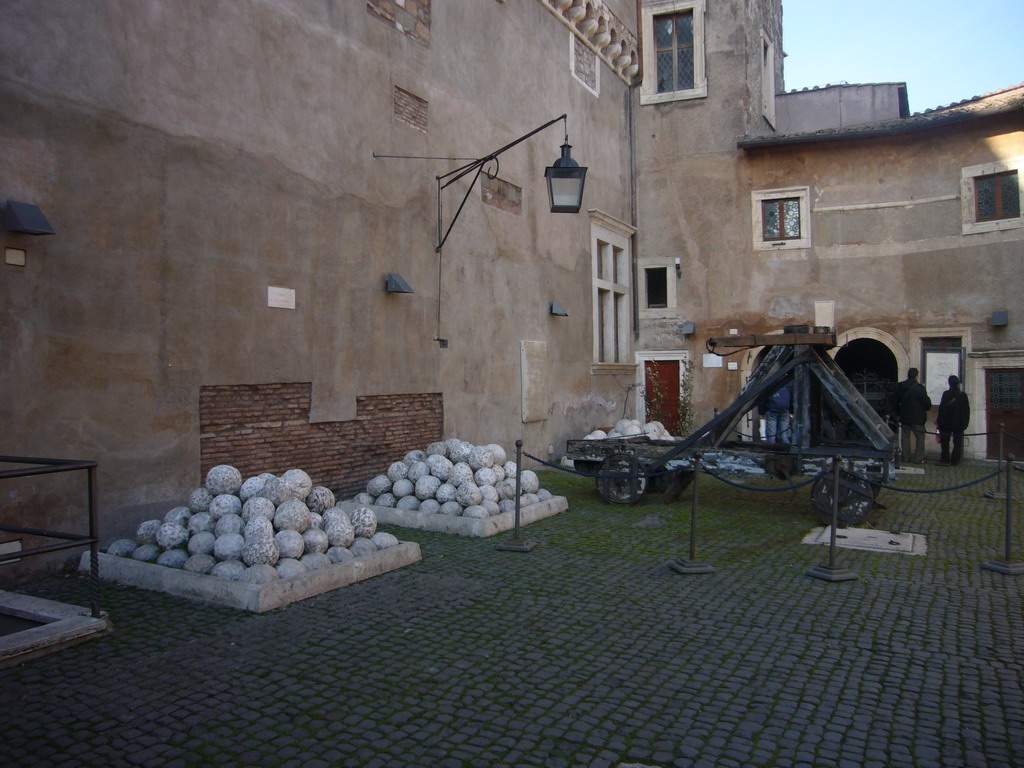 The Courtyard of the Castel Sant`Angelo, with a catapult and stone rocks