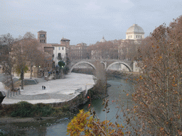 The Tiber Island, with the Torre dei Caetani tower, the Ponte Fabricio bridge over the Tiber river, and the Great Synagogue of Rome