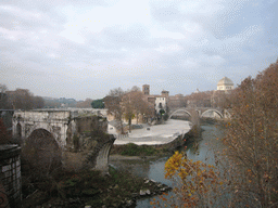 The Pons Aemilius bridge, the Tiber Island, with the Torre dei Caetani tower, the Ponte Fabricio bridge over the Tiber river, and the Great Synagogue of Rome