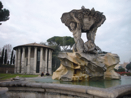 The Fontana dei Tritoni fountain and the Temple of Hercules Victor