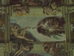 Fresco `The Creation of Adam` at the ceiling of the Sistine Chapel at the Vatican Museums