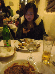 Miaomiao having dinner in a restaurant in the city center, at New Year`s Eve