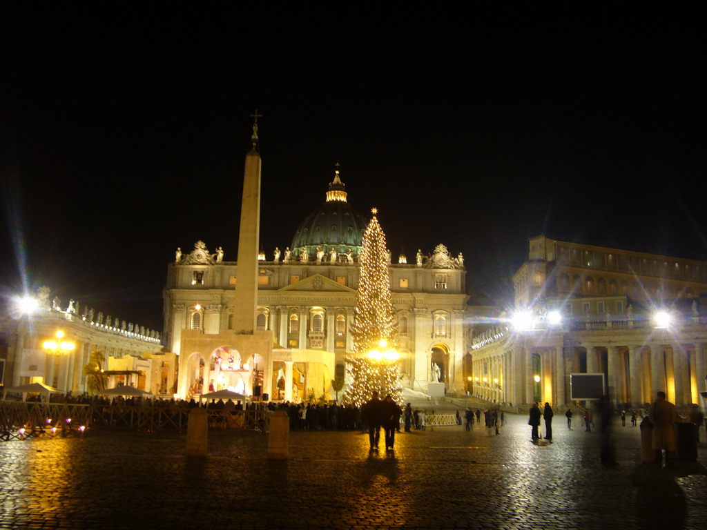 Saint Peter`s Square, with St. Peter`s Basilica, the Vatican Obelisk, a christmas tree and the Nativity of Jesus, at New Year`s Eve