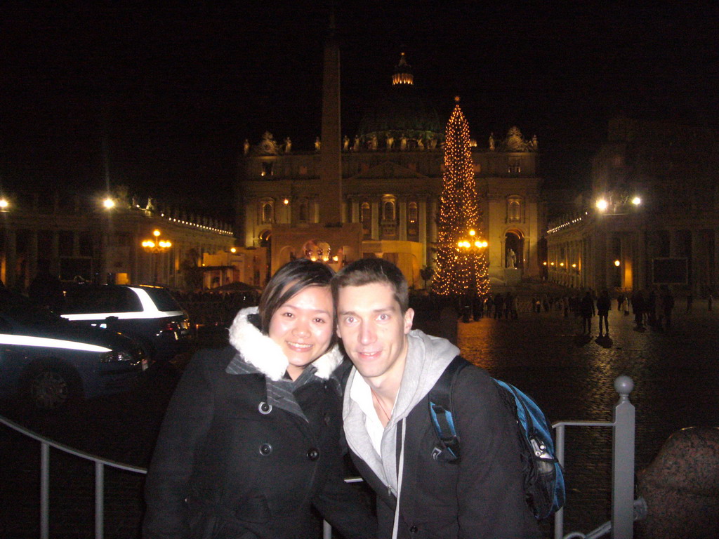 Tim and Miaomiao at Saint Peter`s Square, with St. Peter`s Basilica, the Vatican Obelisk, a christmas tree and the Nativity of Jesus, at New Year`s Eve