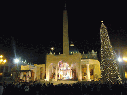 Saint Peter`s Square, with St. Peter`s Basilica, the Vatican Obelisk, a christmas tree and the Nativity of Jesus, at New Year`s Eve