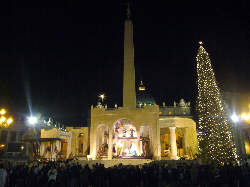 Saint Peter`s Square, with St. Peter`s Basilica, the Vatican Obelisk, a christmas tree and the Nativity of Jesus, at New Year`s Eve