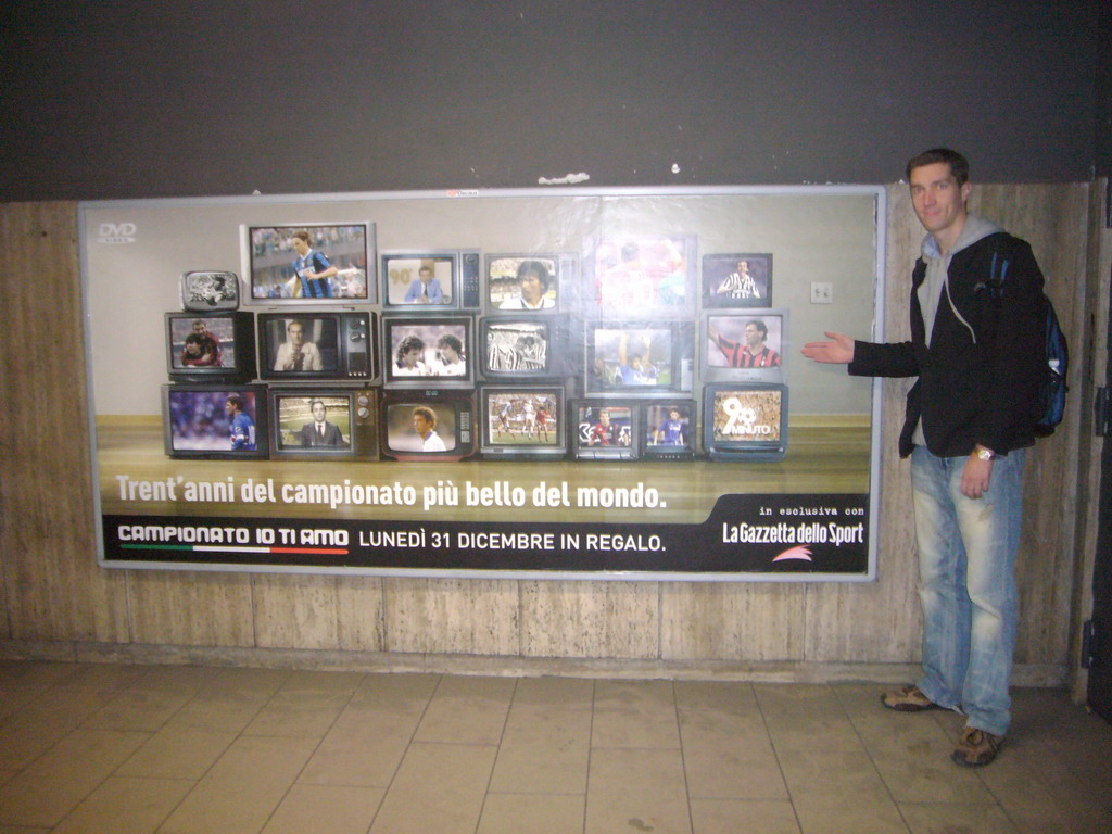 Tim at a commercial poster with Marco van Basten, in a subway station