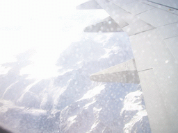 View on mountains of the Alps, from the plane from Rome