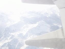 View on mountains of the Alps, from the plane from Rome