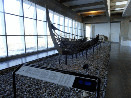 The Skuldelev 5 viking ship at the Viking Ship Hall at the Middle Floor of the Viking Ship Museum, with explanation