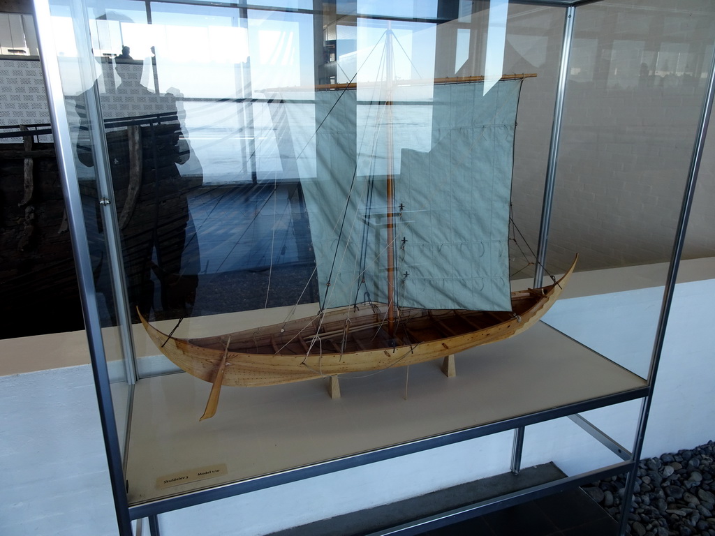 Scale model of the Skuldelev 3 viking ship at the Viking Ship Hall at the Middle Floor of the Viking Ship Museum, with explanation