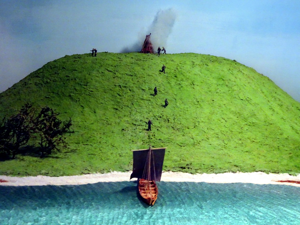 Scale models of a viking ship and a fire at a reconstruction of an 11th century attack on the Roskilde Harbour, at the Middle Floor of the Viking Ship Museum