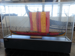 Scale model of the Skuldelev 2 viking ship at the Viking Ship Hall at the Middle Floor of the Viking Ship Museum, with explanation