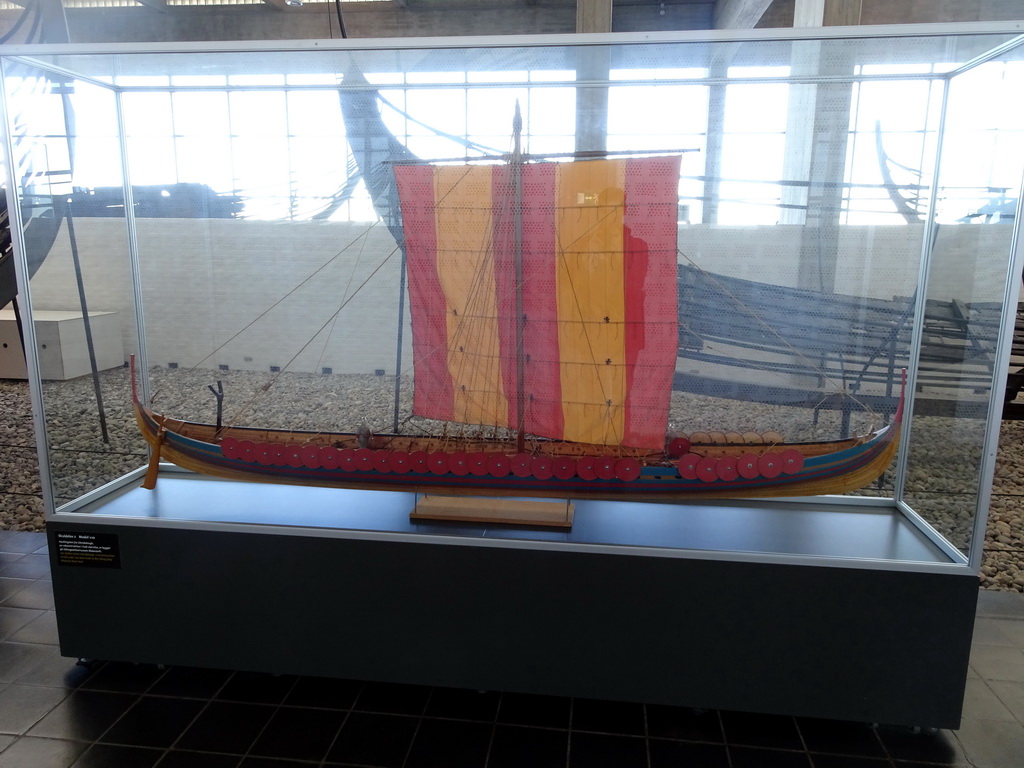 Scale model of the Skuldelev 2 viking ship at the Viking Ship Hall at the Middle Floor of the Viking Ship Museum, with explanation