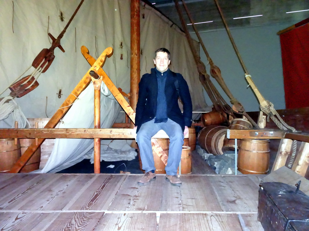 Tim on a viking ship at the `Climb Aboard` exhibition at the Middle Floor of the Viking Ship Museum