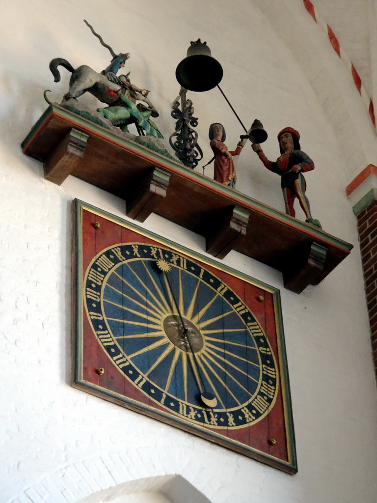 Clock with mechanical figures at the southwest side of the nave of the Roskilde Cathedral