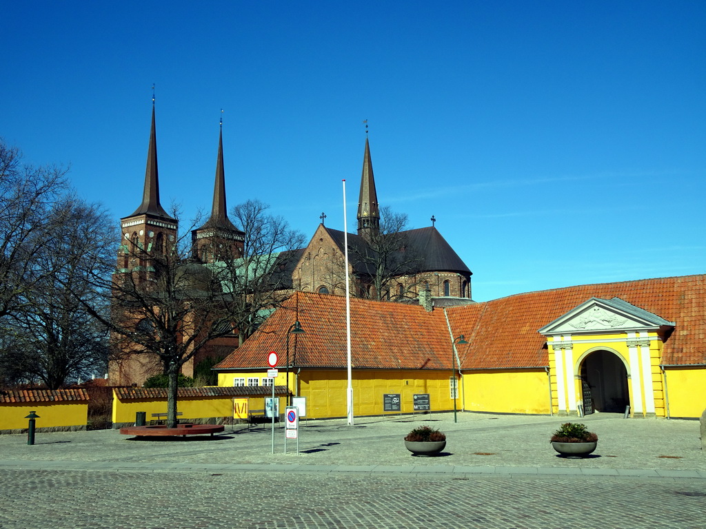 The Roskilde Cathedral and the garden of the Roskilde Palace, viewed from the Palæstræde street