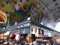 Market stall with meat and wine in the Markthal building