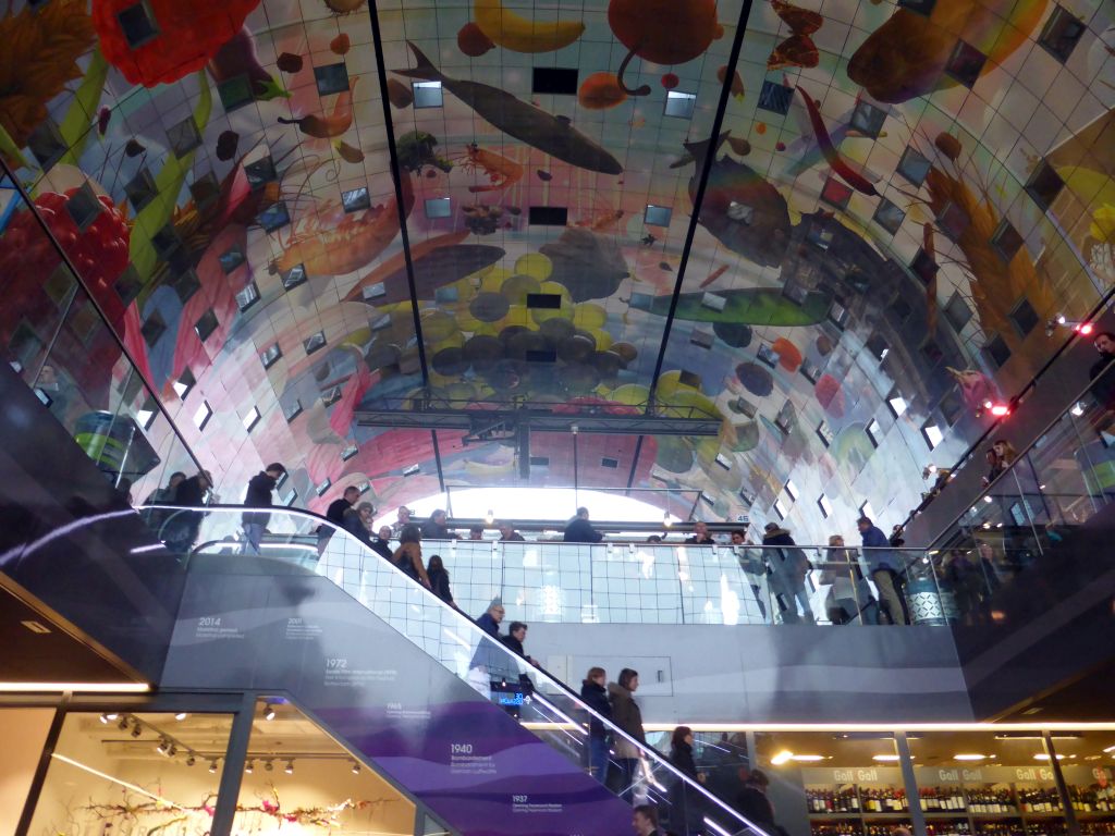 The Markthal building with its ceiling, viewed from the escalator from the lower levels