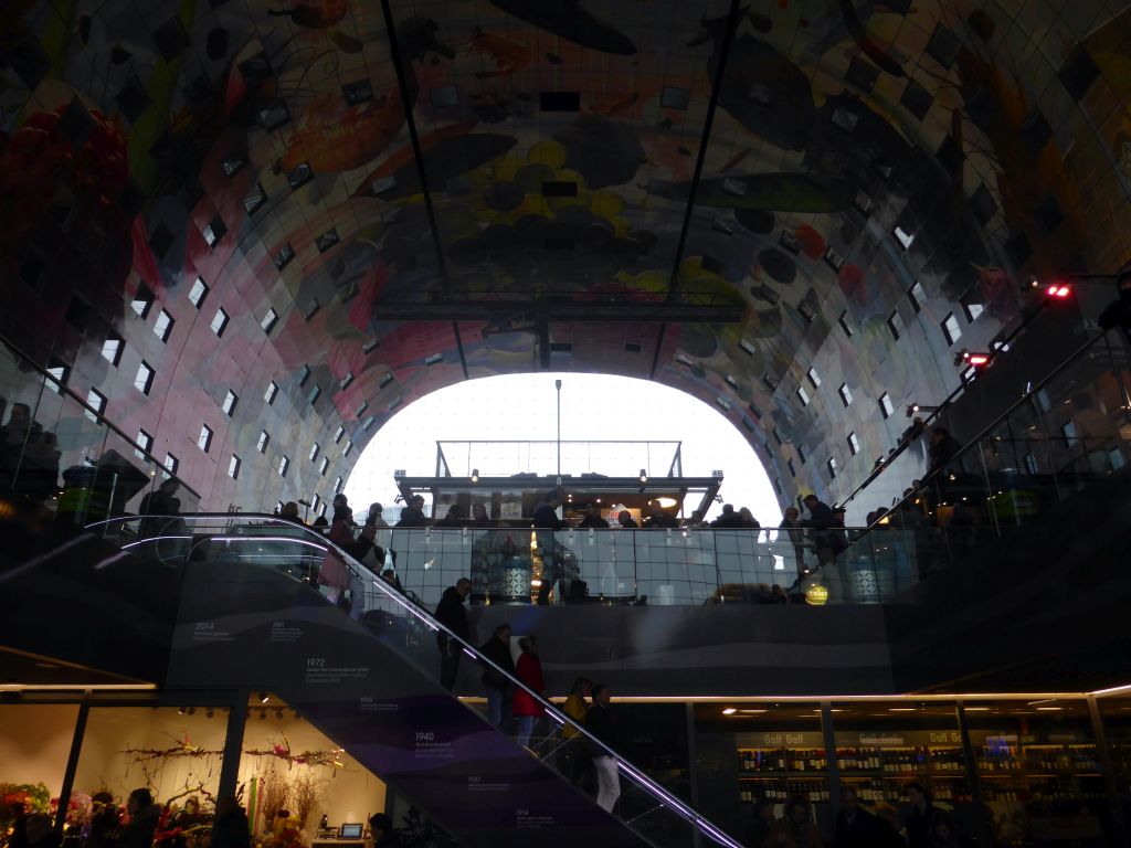 The Markthal building with its ceiling, viewed from the escalator from the lower levels