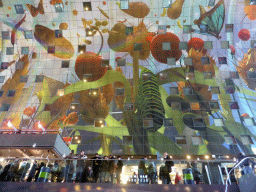 The Markthal building with its ceiling, viewed from the escalator from the lower levels