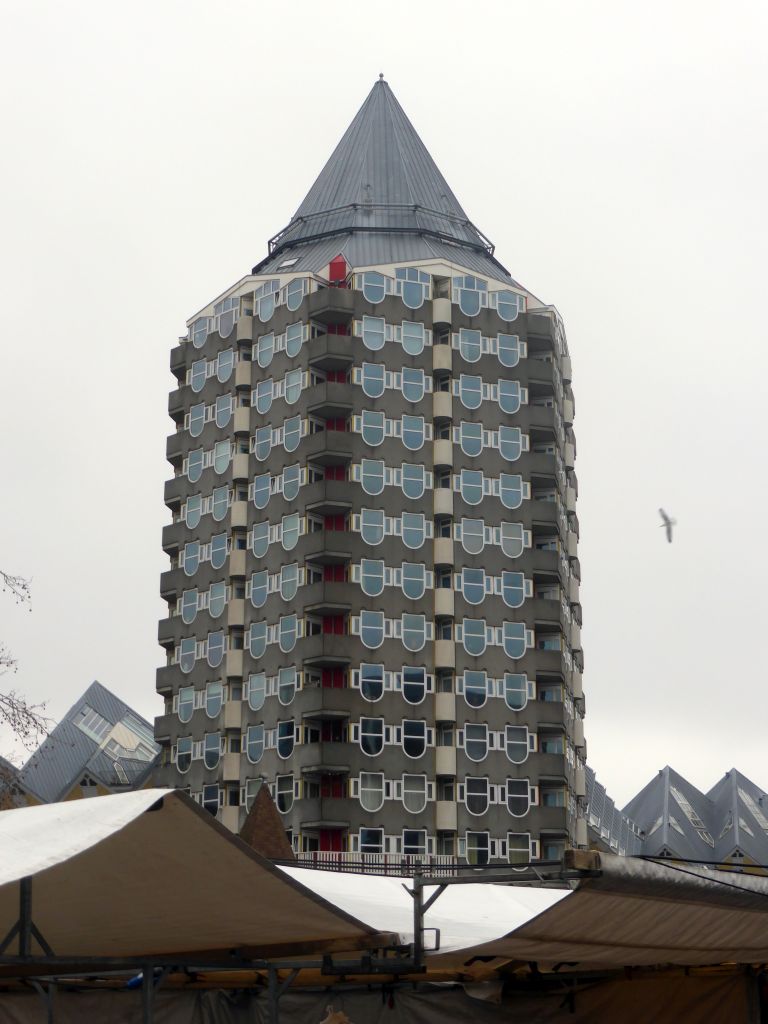 The Blaaktoren tower and market stalls at the Binnenrotte square