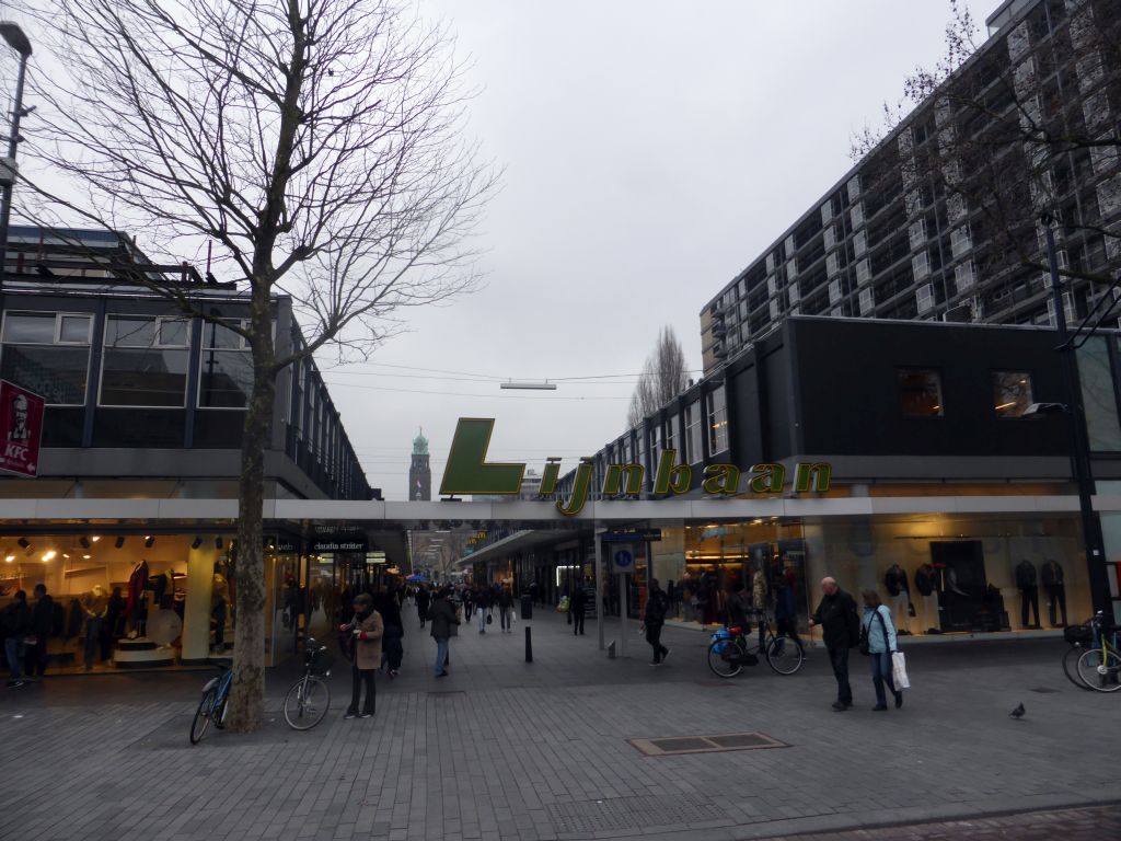 West entrance to the Korte Lijnbaan shopping street, and the tower of the City Hall