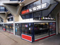 Front of the Kimchi Bar Korean Restaurant at the Churchillplein square