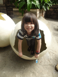 Max in a Turtle egg statue at the Oceanium at the Diergaarde Blijdorp zoo