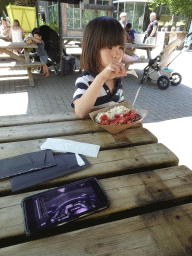 Max eating a waffle at the terrace of the restaurant of the Biotopia playground in the Rivièrahal building at the Africa area at the Diergaarde Blijdorp zoo