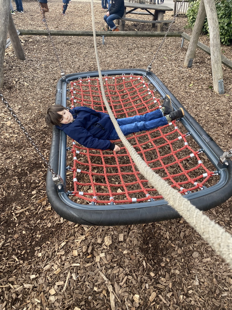 Max on a swing at the playground at the Oewanja Lodge at the Africa area at the Diergaarde Blijdorp zoo