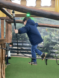 Max on a rope bridge at the Biotopia playground in the Rivièrahal building at the Africa area at the Diergaarde Blijdorp zoo