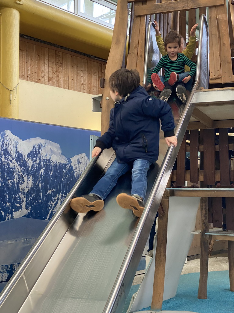 Max on a slide at the Biotopia playground in the Rivièrahal building at the Africa area at the Diergaarde Blijdorp zoo