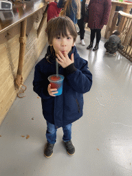 Max drinking a slush puppie at the Biotopia playground in the Rivièrahal building at the Africa area at the Diergaarde Blijdorp zoo