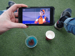 Tim watching the Winter Olympics 2022 at the Biotopia playground in the Rivièrahal building at the Africa area at the Diergaarde Blijdorp zoo