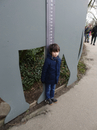 Max with an elephant tape measure at the Asia area at the Diergaarde Blijdorp zoo