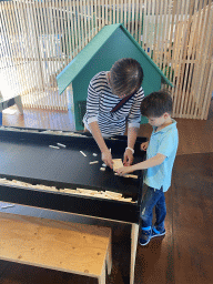 Miaomiao and Max playing with bricks at the lower floor of the Villa Zebra museum