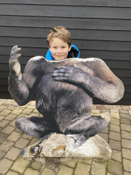 Max`s friend with a Gorilla cardboard in front of the Western Lowland Gorilla enclosure at the Africa area at the Diergaarde Blijdorp zoo