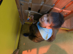 Max playing a game at the Egyptian House at the Biotopia playground in the Rivièrahal building at the Africa area at the Diergaarde Blijdorp zoo