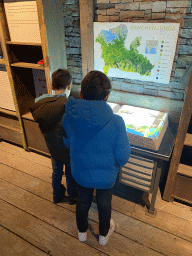 Max and his friend playing a game at the Forest Guardian Hut at the Himalaya Area at the Asia area at the Diergaarde Blijdorp zoo