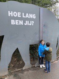 Max and his friend with an elephant tape measure at the Asia area at the Diergaarde Blijdorp zoo