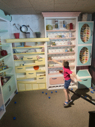 Max playing a ball game at the Huis in de Heuvel building at the Speelwijck area of the Plaswijckpark recreation park