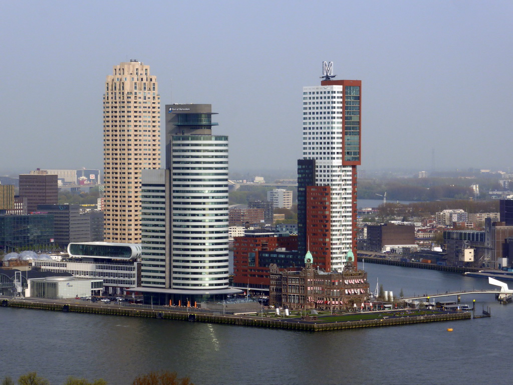 The Nieuwe Maas river, the Rijnhaven harbour, the New Orleans tower, the World Port Center tower, Hotel New York and the Montevideo tower, viewed from the restaurant in the Euromast tower
