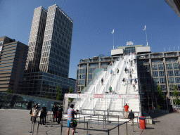 The `De Trap` staircase leading from the Stationsplein square to the top of the Groothandelsgebouw building