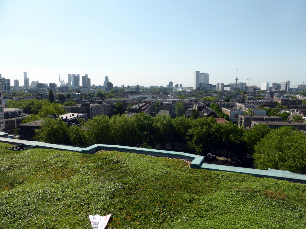 The south side of the city with the Erasmus MC hospital, the Euromast tower, the Erasmusbrug bridge and skyscrapers in the city center, viewed from the roof of the Groothandelsgebouw building