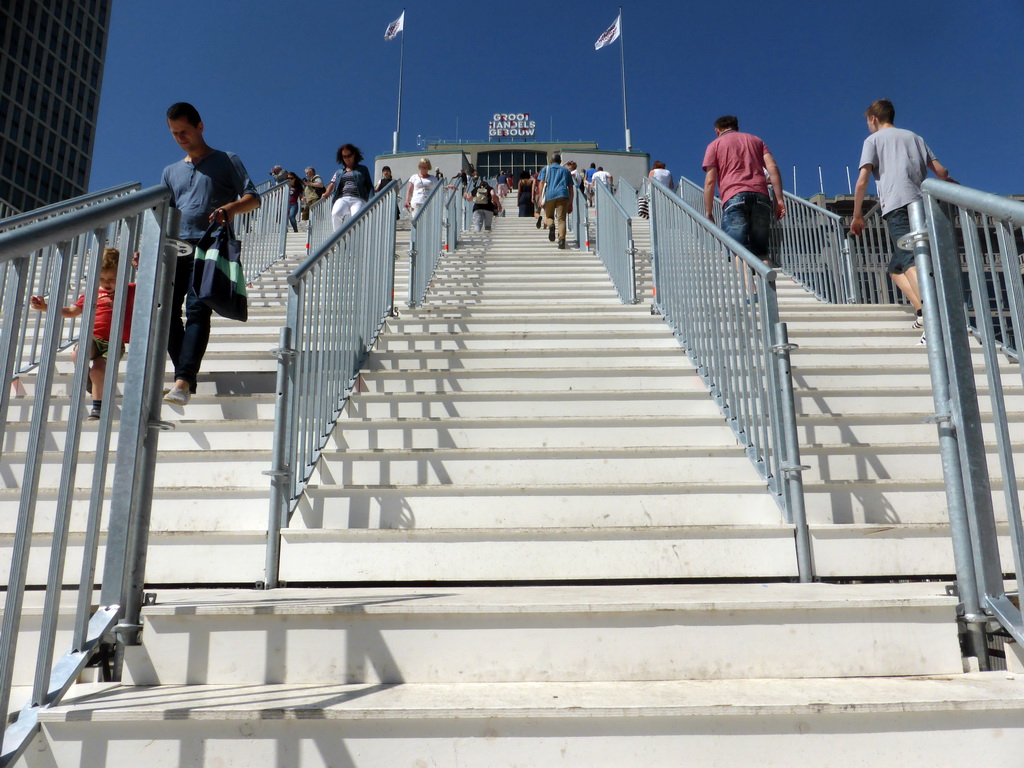 The `De Trap` staircase leading from the Stationsplein square to the top of the Groothandelsgebouw building, viewed from the lower end