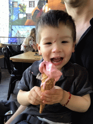 Max eating an ice cream at our lunch restaurant 21 Pinchos in the Markthal building