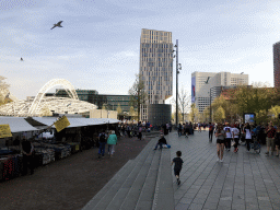 Max with market stalls and the Rotterdam Blaak Railway Station at the Binnenrotte square