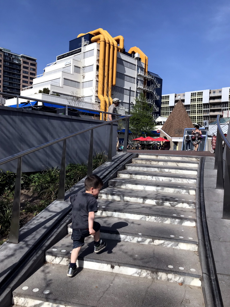 Max on the staircase of the bicycle parking lot of the Rotterdam Blaak Railway Station at the Binnenrotte square