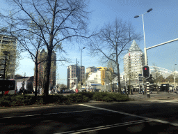 The Binnenrotte square with the Markthal building, the Blaaktoren tower, the Rotterdam Blaak Railway Station and the Kubuswoningen buildings, viewed from the car on the Blaak street